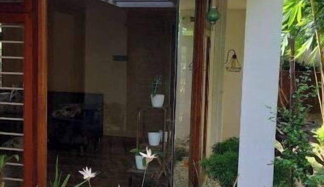 Cozy Glass Villa home. Five minutes walk to the happening Varkala cliff in Varkala