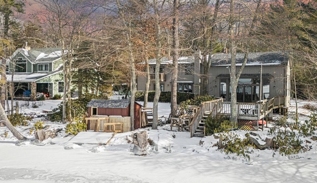 Deck w/Lake Views, Fireplace, Shuffleboard, and Office | Lakeside Retreat in Tafton
