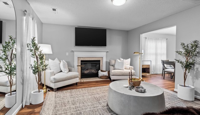 NEW! Crest Stone Manor! LUX Cozy Fire pit/Fireplace, Theater TV's, Comfy beds! in Kernersville