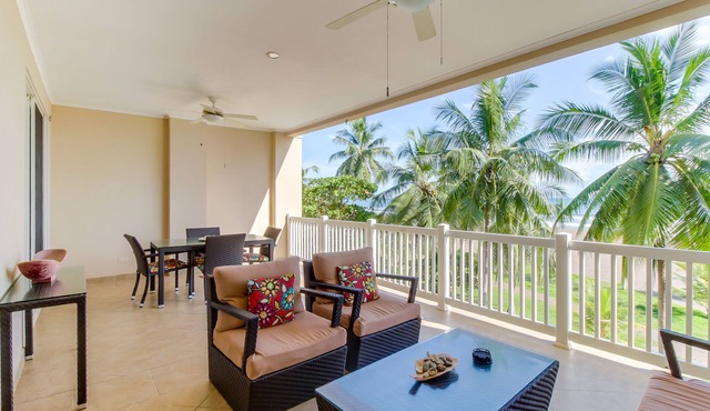 Oceanfront condo with sweeping beach views, pool & private balcony in Jacó