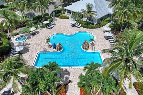 Spacious 2BR Lely Resort Condo with Lake View steps to Pool Hot Tub Gym in Naples