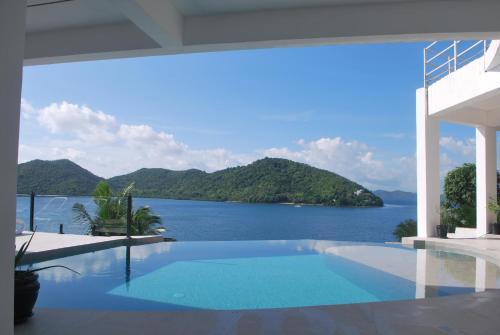 Stunning luxe 220sm villa by the sea entirely private with own pool in Busuanga