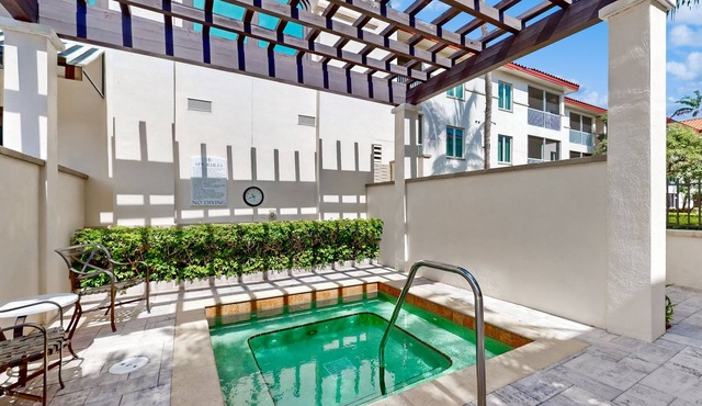 Style, comfort, and convenience-Just a short walk to the heated outdoor pool in Naples